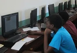 Picture of students using a PC