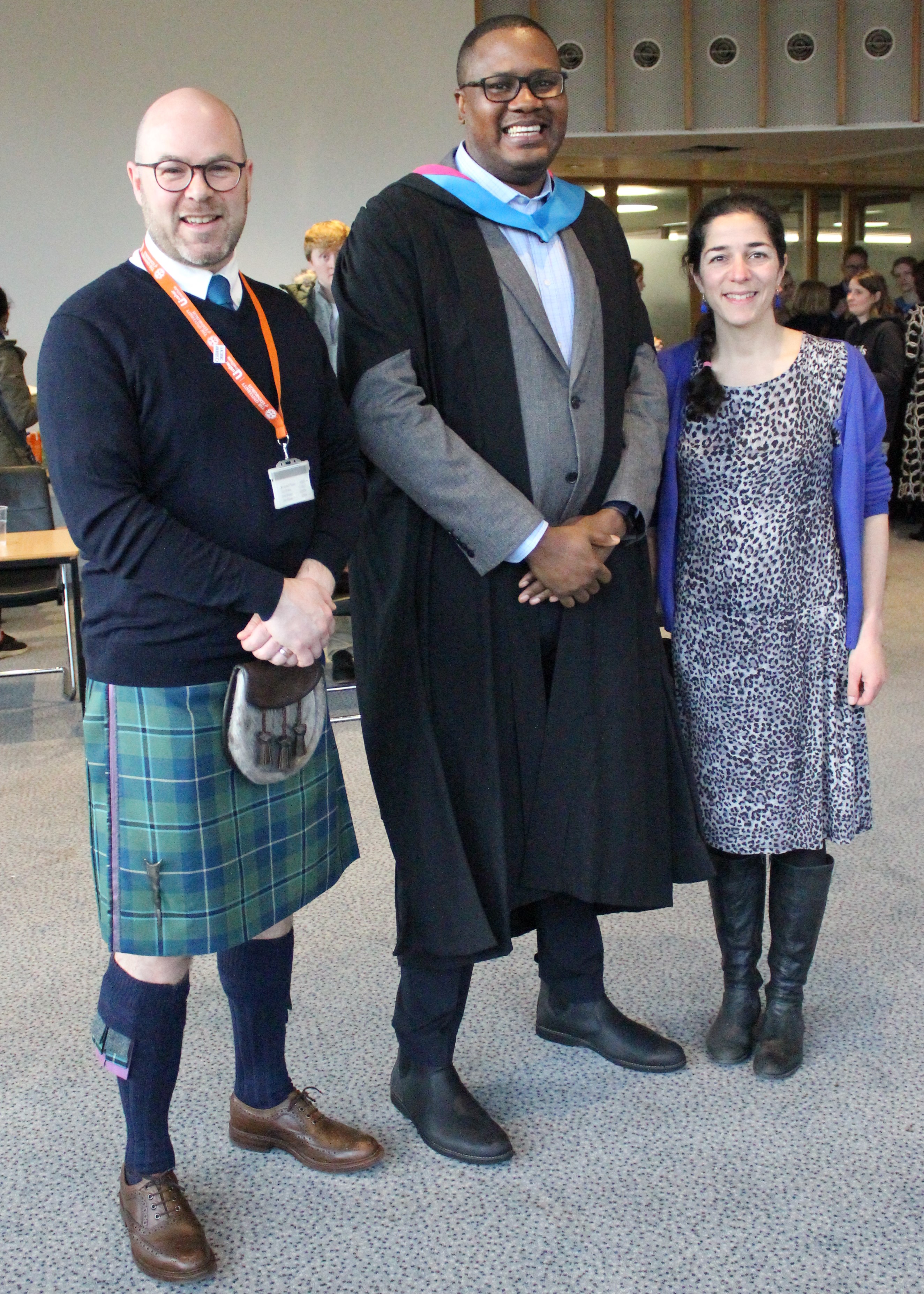 Photo of Dr Robin, Dr Elika and 2022 MFM graduate